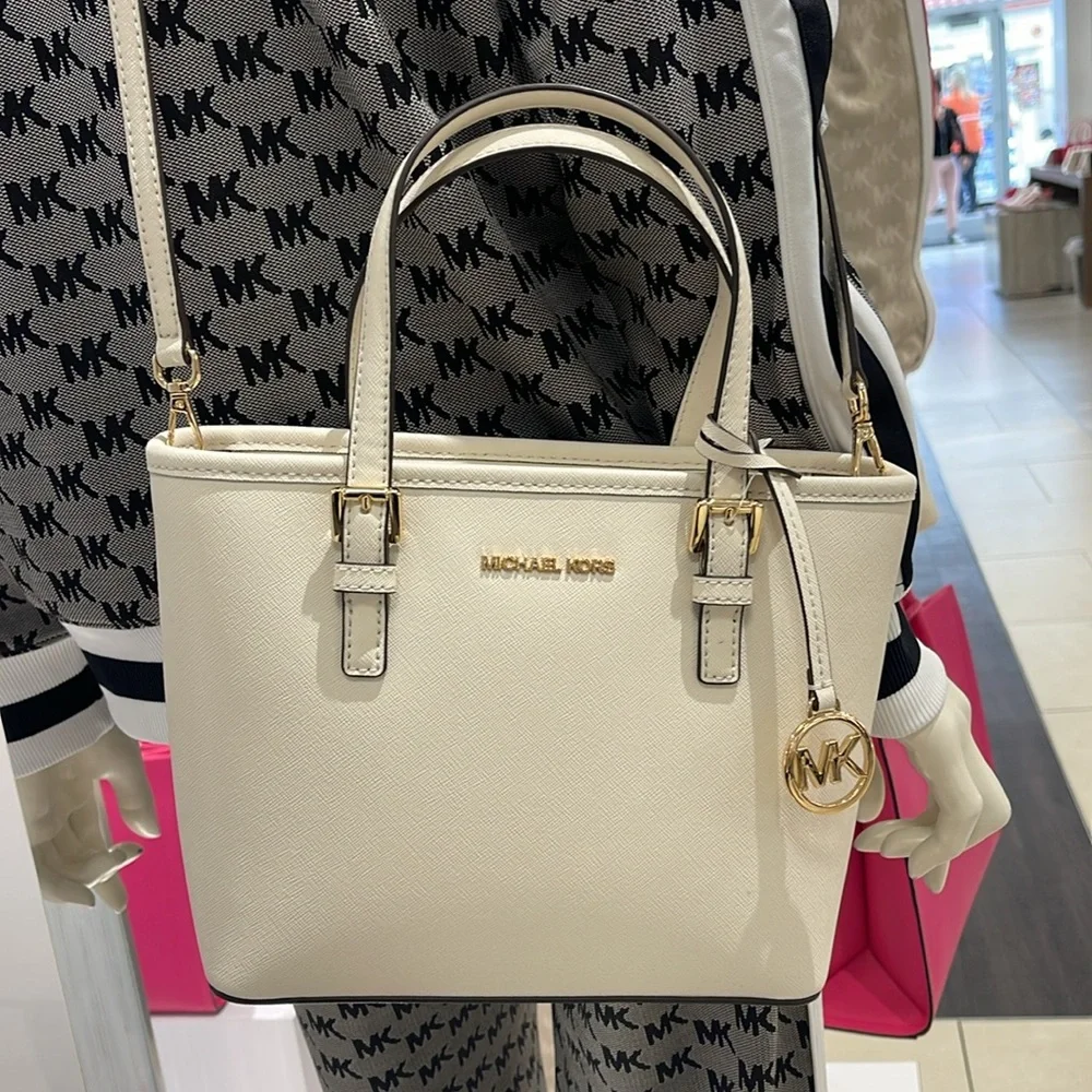 Michael Kors Jet Set Travel Extra-Small Top-Zip Tote Carryall Bag
Light Cream - Picture 16 of 16